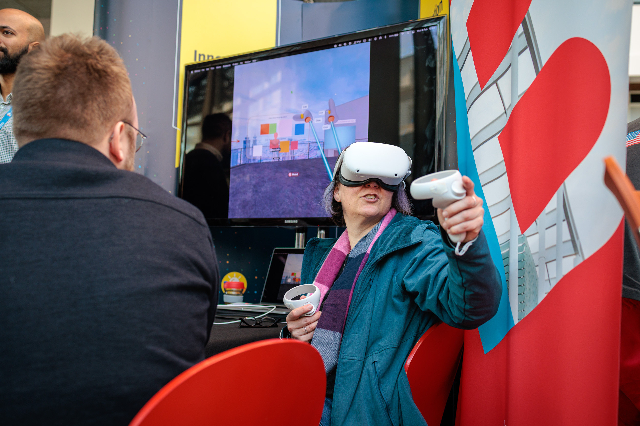 Staff member using VR headset